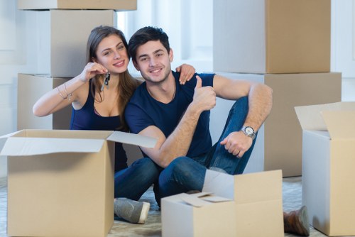 Professional movers handling furniture